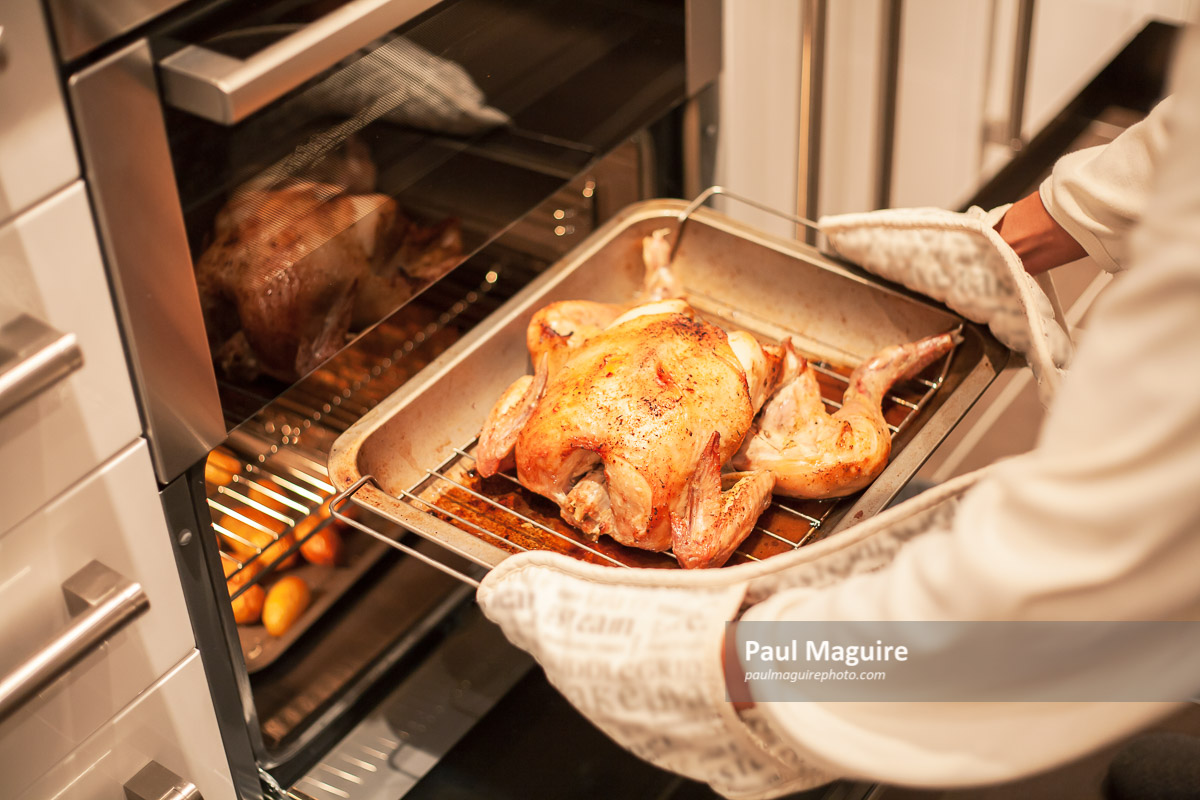 Stock photo Cooking roast chicken in an oven Paul Maguire
