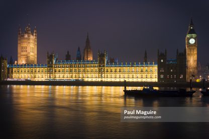 Palace of Westminster at night from River Thames, London, UK