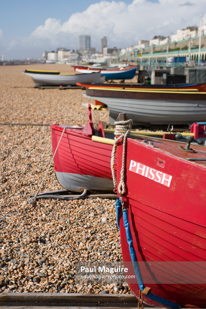 Fishing boats on beach in Brighton, East Sussex, UK