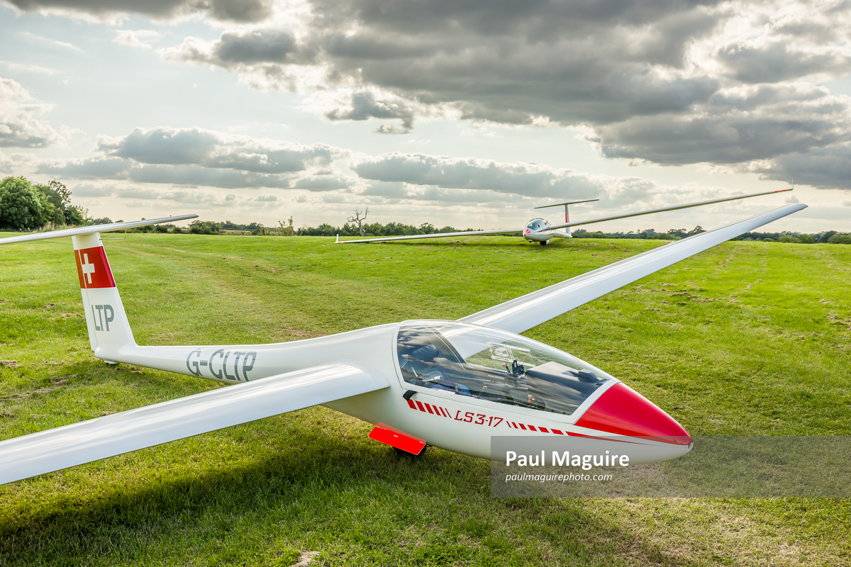 Gliders parked on grass airfield, Buckinghamshire, UK