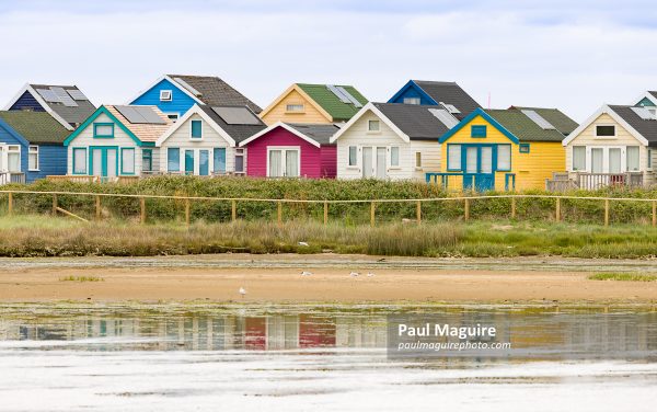 Row of beach houses, holiday homes at Hengistbury Head Dorset UK