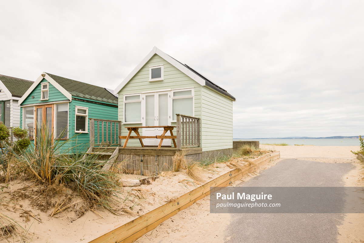 Beach huts at the seaside, Hengistbury Head, Dorset, UK
