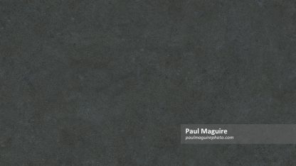 Dark gray stone texture seamless repeating tileable background